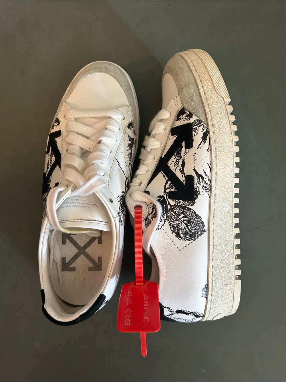 Off-White Kids White Sneakers with Black Arrow Graphic and Red Zip Tie